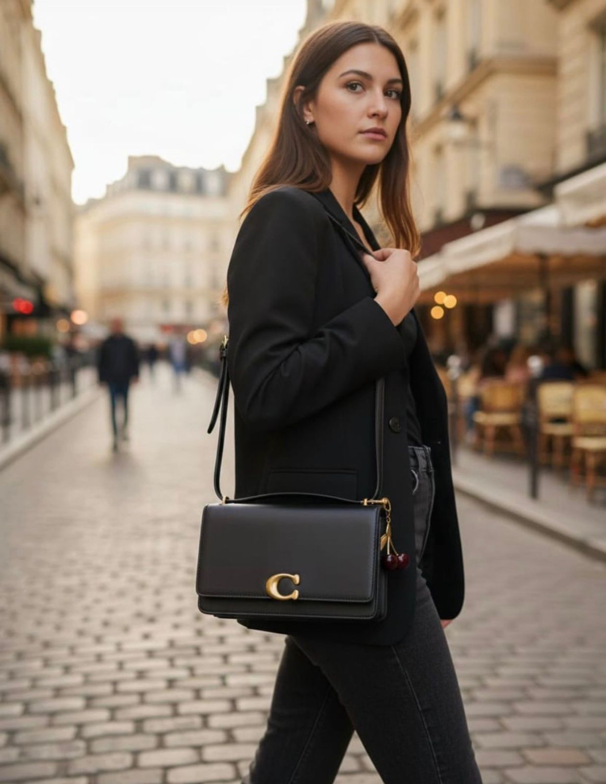 Cartera Coach Bandit Negra + Charm de cereza