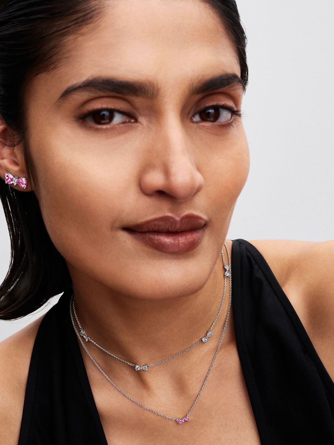 Aretes Pandora Moño Rosa Brillante