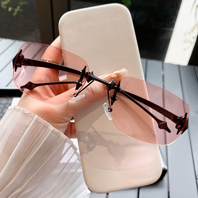 Lentes De Sol Sin Borde Rosa Con Negro