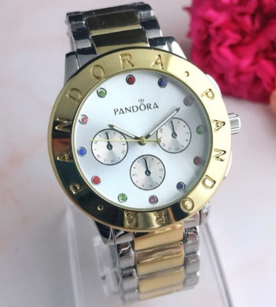 Reloj Pandora plateado con dorado y brillos de colores