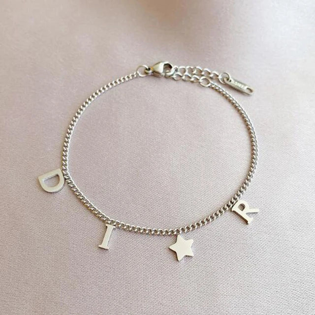 Pulsera Dior Con Estrella Plateada