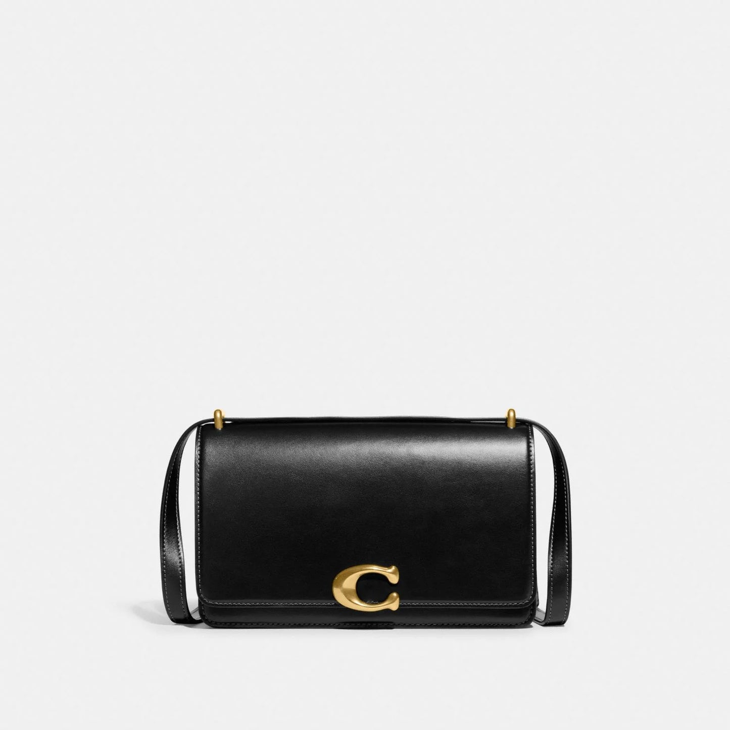 Cartera Coach Bandit Negra + Charm de cereza