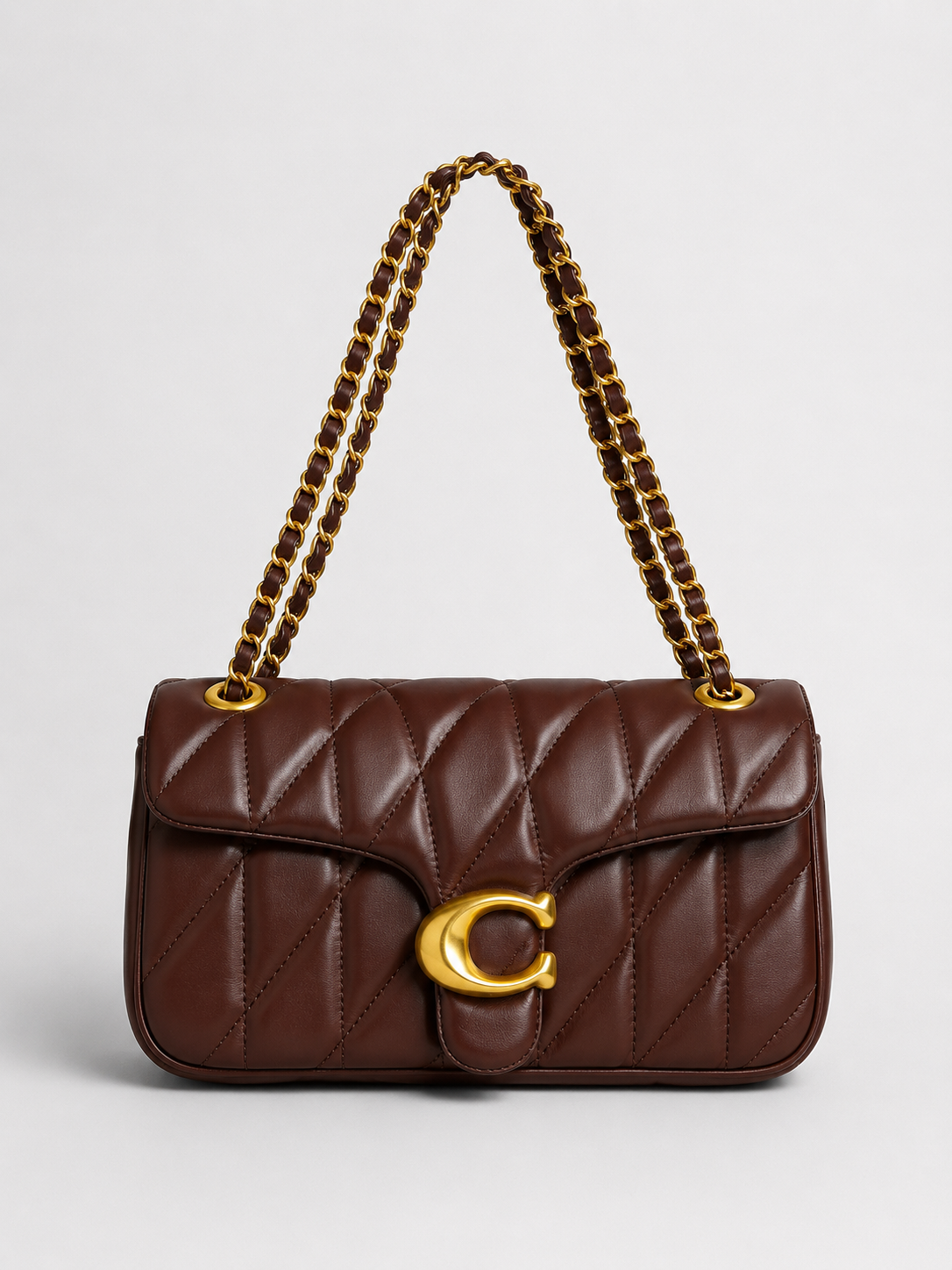 Cartera Coach Quilted Tabby 26 en piel napa acolchada color Café Con Caja