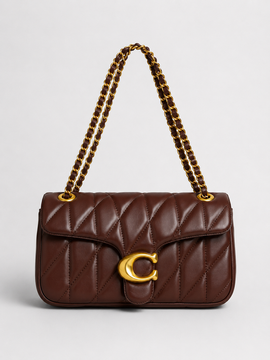 Cartera Coach Quilted Tabby 26 en piel napa acolchada color Café Con Caja