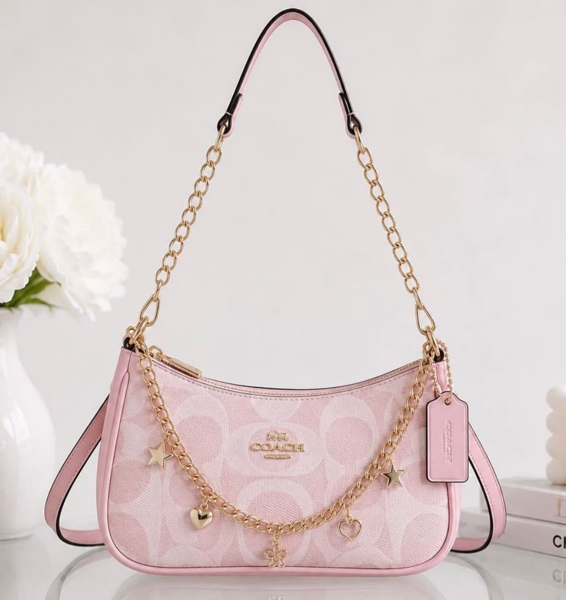 Cartera Coach Teri De Hombro Rosada Con Charm Largo