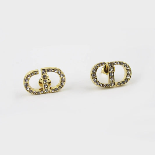 Aretes Christian Dior Dorados