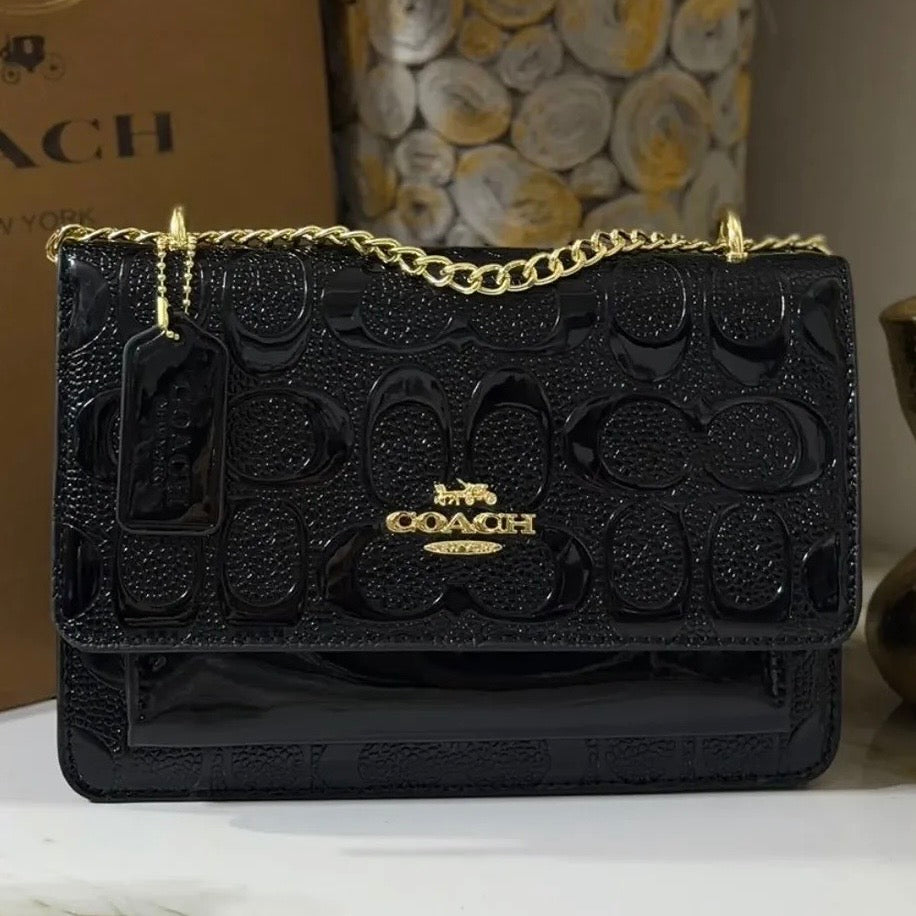 Cartera Coach Bandolera Klare Negra En Charol